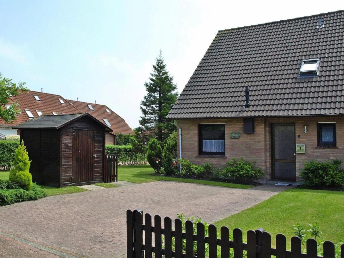 Ferienhaus Mit Grossem Garten In Nessmersiel Exterior photo